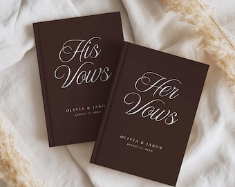 May include: Two dark brown hardcover vow books with white script text. One book reads His Vows and the other reads Her Vows. Both feature the names Olivia & Jason and the date August 17, 20XX printed in a clean, sans-serif font below the script.