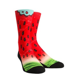 May include: A pair of red and green socks with a watermelon print. The socks have a black toe and heel.