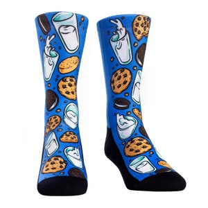 May include: A pair of blue socks featuring a fun design of cookies, milk, and chocolate chip cookies. The socks are made from a soft, comfortable material and are ideal for everyday wear.