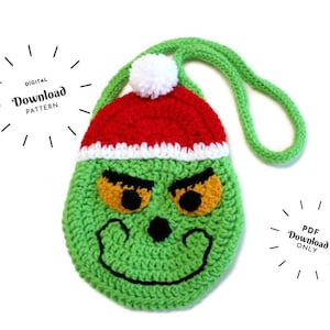 May include: A green crocheted Grinch-faced bag with a red and white Santa hat. The bag has a green strap and a white pom-pom on the hat. The text "DIGITAL Download PATTERN" and "PDF Download ONLY" are also visible.
