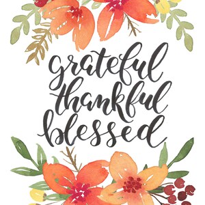 May include: Watercolor painting of orange flowers with green leaves and red berries. The text "grateful thankful blessed" is written in black calligraphy.