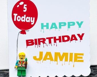 Personalised card with Lego artist 'painting'  'Happy Birthday' (with a real lego person)