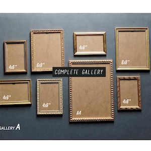 May include: Nine decorative picture frames in gold and brown, including 4x6 inch and 6x8 inch frames, are displayed against a dark grey backdrop. The image includes the text "COMPLETE GALLERY" and "GALLERY A". The frames measure approximately 10x15 cm and 15x20 cm.
