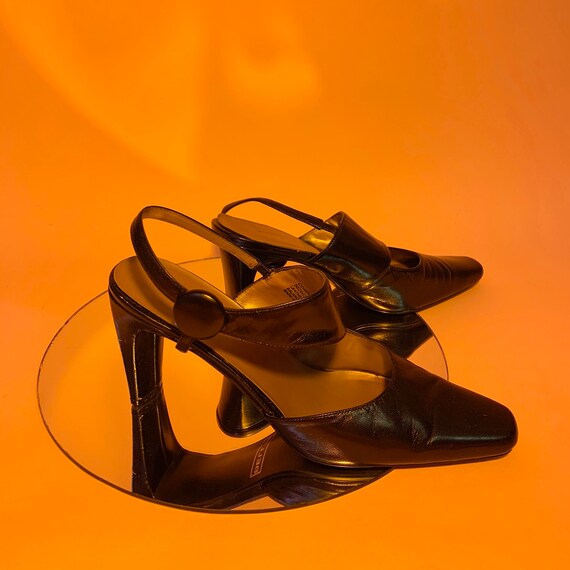 Strappy pointy asymmetrical heels