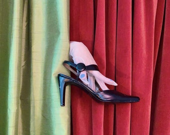 Strappy pointy asymmetrical heels