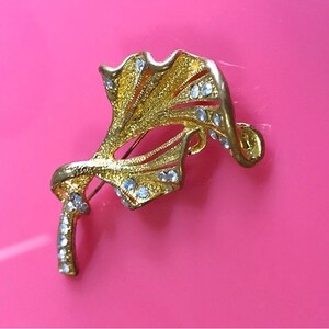 Gold flower with rhinestone