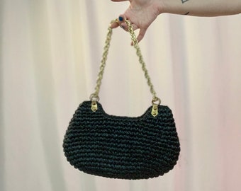 MCM straw purse by Morris Moskowitz