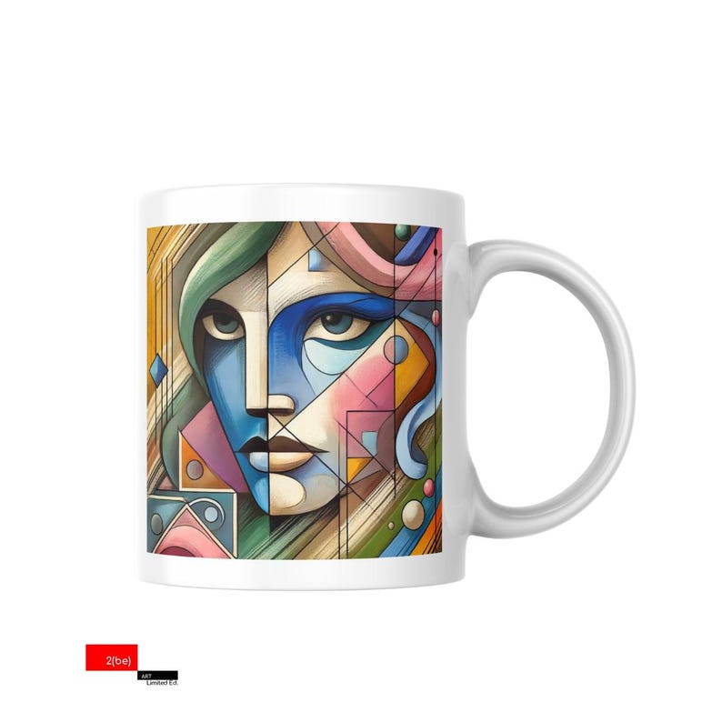May include: White ceramic mug with a colorful abstract design of a face. The design features geometric shapes in shades of blue, green, pink, and yellow.