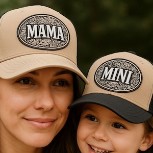 May include: Two tan and black trucker hats, one with "MAMA" and the other with "MINI" in white script within an oval design. The hats are worn by a woman and a child. The image also includes the text "INSTANT DIGITAL DOWNLOAD".