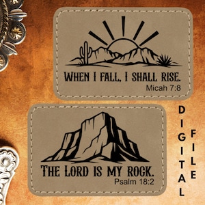 May include: Two rectangular, tan leather patches with black text and graphics. The top patch features a desert scene with the text "WHEN I FALL, I SHALL RISE. Micah 7:8." The bottom patch shows a mountain with the text "THE LORD IS MY ROCK. Psalm 18:2."