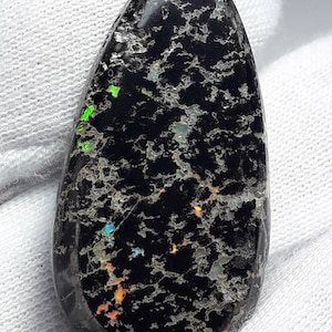 28 Ct Black Leopard Opal, Cabochon from Mexico.
