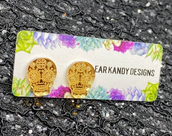 Calaveras de azúcar doradas