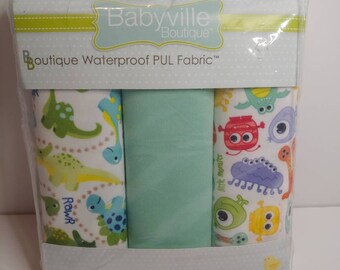 Babyville dinosaur licensed waterproof fabric bib