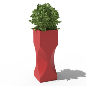 May include: A tall, red, geometric planter with a green leafy plant. The planter has a unique hourglass shape in the middle. The plant is a vibrant green, contrasting with the red planter. The planter is suitable for indoor or outdoor use.