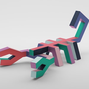 May include: A geometric scorpion sculpture in shades of red, purple, green, blue, and pink. The abstract design features a segmented body and a curved tail, set against a white background.