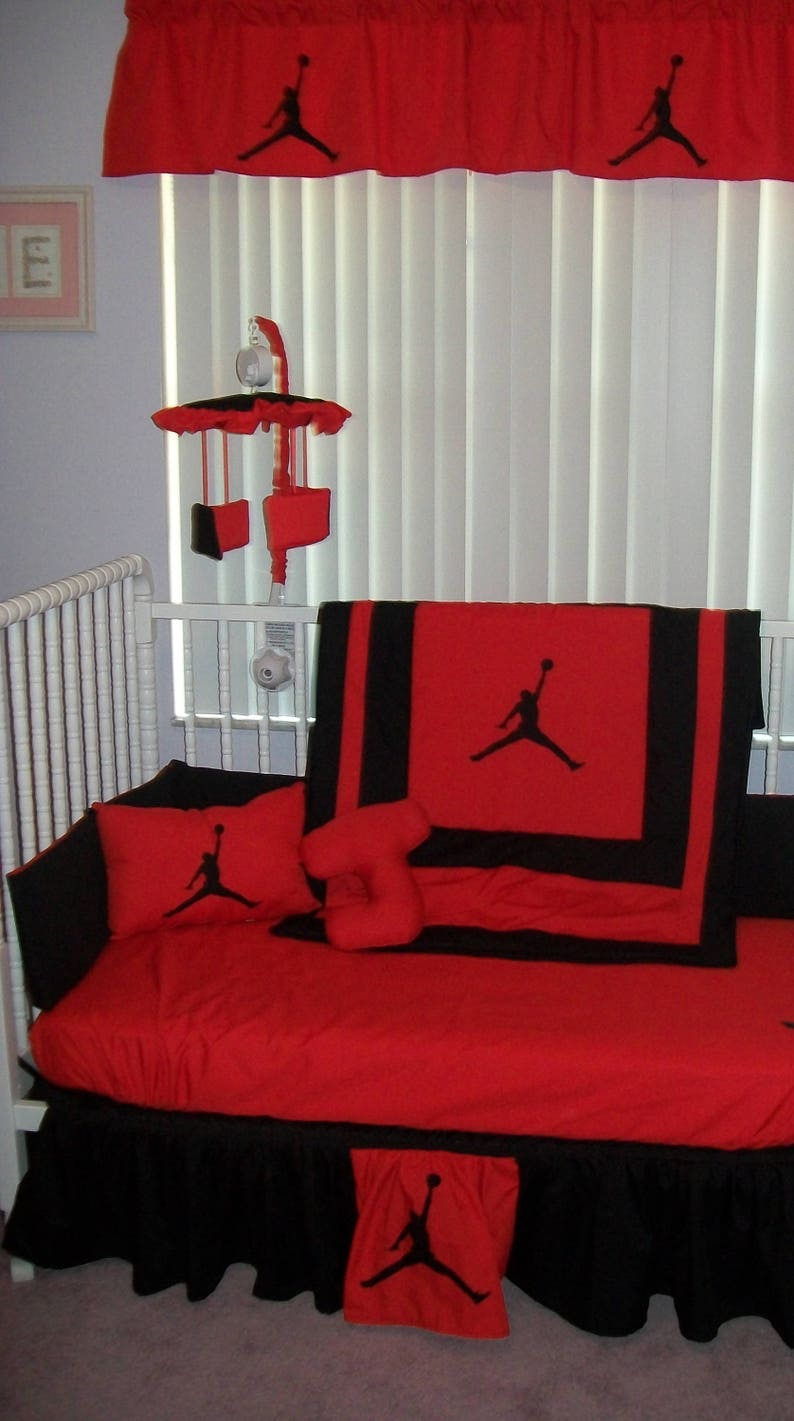 red baby crib