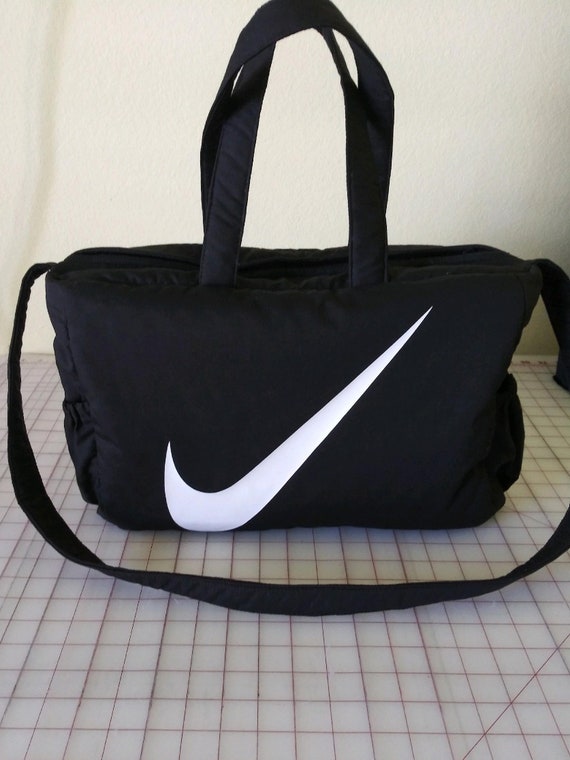 لي تصل المركز التجاري nike diaper bag 