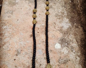 Brass necklace with spiral coints and black beads