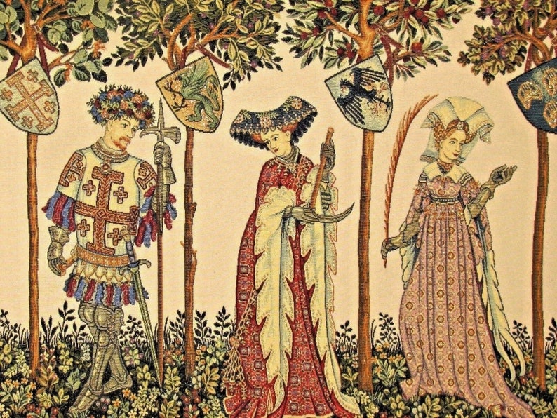 May include: A tapestry depicting three figures in a medieval setting. A knight in armour stands on the left, a woman in a long red gown stands in the centre, and a woman in a pink gown stands on the right. Each figure is holding a weapon or object, and there are trees and shields in the background.