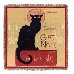 May include: A vintage-style woven tapestry featuring a black cat sitting on a red platform. The text "Tournée du Chat Noir avec Rodolphe Salis" is printed in black and red on a beige background. The tapestry has a fringed border.