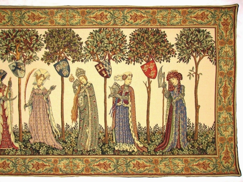 May include: A tapestry depicting five women in medieval clothing standing in a forest. Each woman holds a different object, including a sword, a book, and a bird. The tapestry has a cream background with a green and gold border.