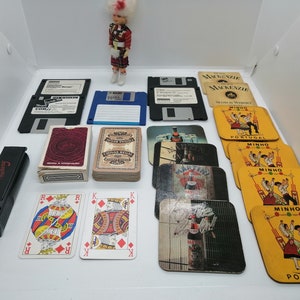 Vintage Lot of PC Floppy Disks, Chivas Decks of Cards, Martini Coasters, toy UK miliatry puppet, manual cigarrette machine etc..