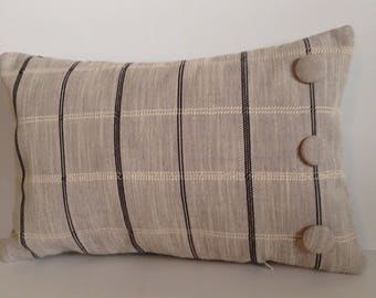 Grey rectangular pillow. Accent, neck or lower back.