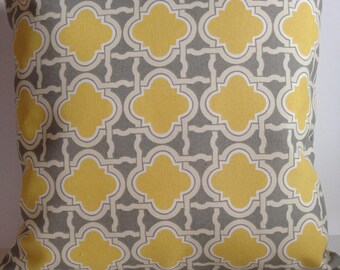 Diseño geométrico en amarillos y grises