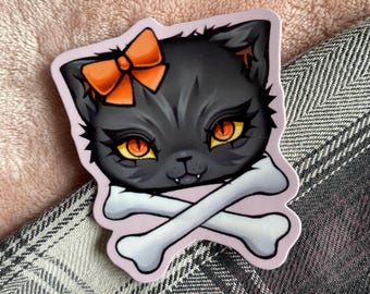 Halloween Crossbones Kitty | Ursprünglicher Charakter |  Schwarze Katze Orange Pink Gruselige Schleife | Laptop Wasserflaschen Aufkleber glänzender Aufkleber