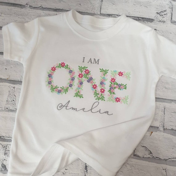 Personalised 1st Birthday T Shirt, I Am One t Shirt,  Embroidered First Birthday T Shirt, Birthday Flower T Shirt, Floral Design