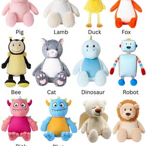 May include: A collection of twelve plush stuffed animals including a pink pig, white lamb, yellow duck, orange fox, black and yellow bee, gray cat, blue dinosaur, robot, pink monster, blue monster, angel bear, and a tan lion with a brown mane.