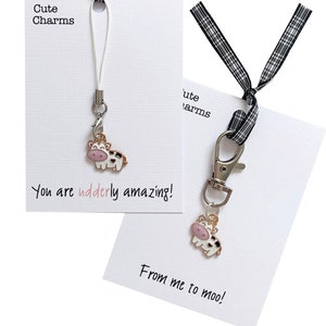 ¡Bonitos dijes! Lindo dije para teléfono o broche de vaca esmaltado hecho a mano. Varios lemas. Regalo ideal de agradecimiento o cumpleaños.