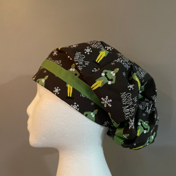 Women’s ‘Elf’ print European style scrub hat made with licensed fabric.
