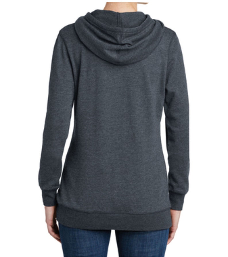 May include: A dark gray hooded sweatshirt with long sleeves and a relaxed fit. The sweatshirt has a drawstring hood and a kangaroo pocket.