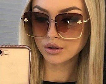 gucci sunglasses with bee on side