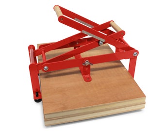 A2 size hand relief press (lino press, lino cut press), double lever operated, double US tabloid/ ledger size. Color: Ral 3000 red