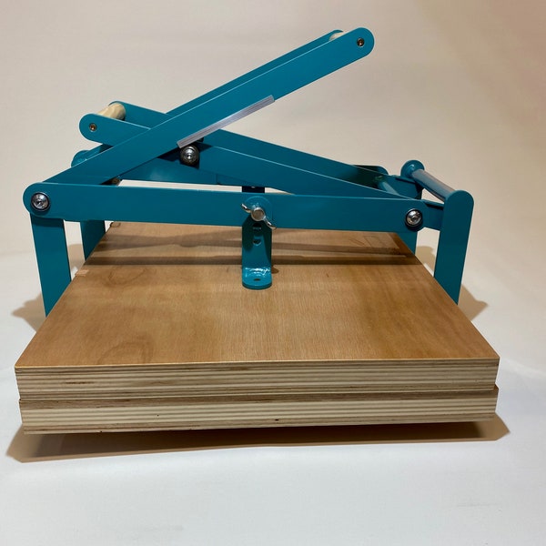 A2 size hand lino press, lino cut press, double lever operated, double US tabloid/ ledger size. Color: Ral 5018 turquoise