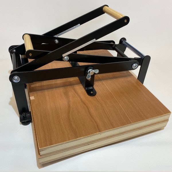 A2 size hand lino press, lino cut press, double lever operated, double US tabloid/ ledger size. Color: mattblack