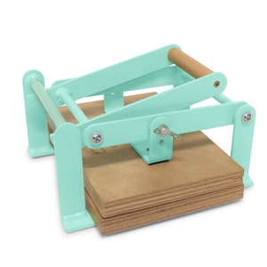 A5-size (junior legal+) hand relief press (lino press, lino cut press), heavy duty, steel, powdercoated pastelgreen (ral 6019)