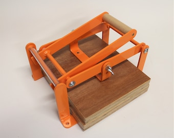 A4-size hand relief press (lino press), lino cut press, heavy duty, steel, US letter size, gloss orange powdercoated