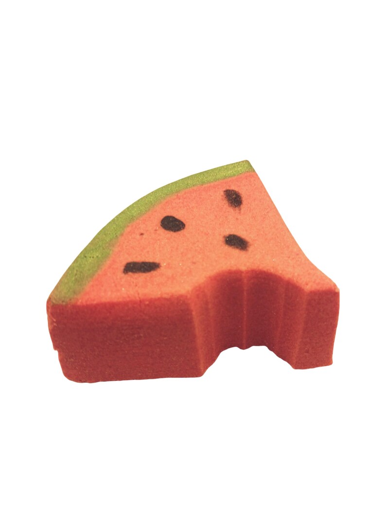 May include: A novelty eraser in the shape of a watermelon slice, with a bite taken out. The eraser is red with black seed details and a green rind. A fun stationery item.