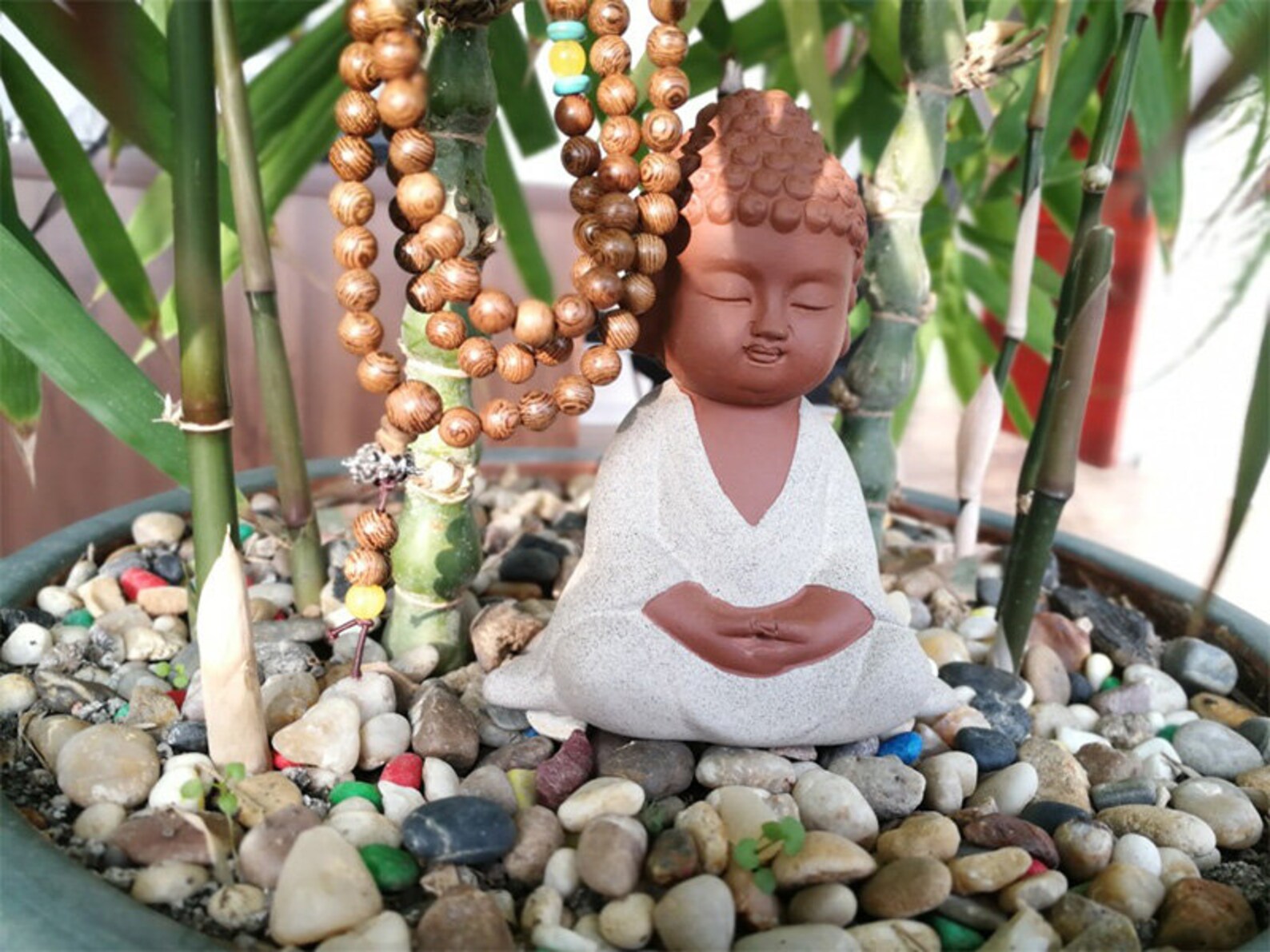 miniature buddha figurines