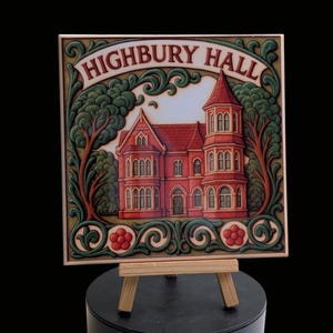 May include: A decorative tile depicting "HIGHBURY HALL", a red building with a tower, surrounded by green foliage and red berries. The tile is displayed on a small wooden easel. The artwork has a detailed, hand-painted appearance, with a vintage aesthetic.