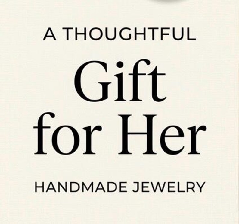 May include: Cream-colored background with black text that reads "A Thoughtful Gift for Her" and "HANDMADE JEWELRY". The text is in a classic serif font, suggesting a focus on handcrafted jewelry.