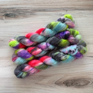 Suri SABER&#39;S GLOW Hand-Dyed Yarn, Lace Weight Yarn, St. Augustine Base, Variegated Yarn, Alpaca Yarn, Silk Blend Yarn, Space Yarn, Neon Yarn