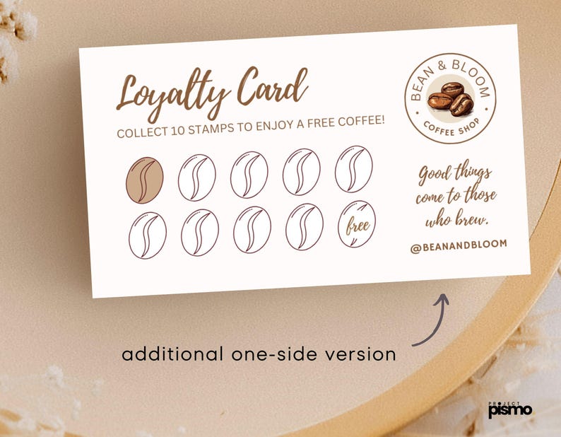 May include: A white loyalty card with a brown coffee bean design. The card says "Loyalty Card" and "Collect 10 stamps to enjoy a free coffee!" There are 10 coffee bean shaped spaces to collect stamps. The card also says "Good things come to those who brew." and "@BEANANDBLOOM".