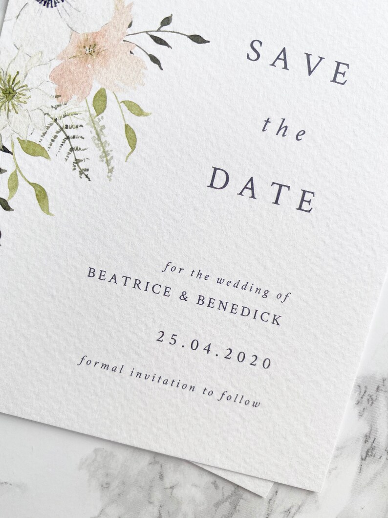 Close up of text on A6 portrait save the date. Text is printed in grey and aligned right in a modern and minimal style. Font is a classic serif font.