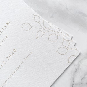Close up of illustration detail on bottom corner of wedding save the date cards. Hand drawn honesty branches in delicate line drawing style with minimal and modern text layout.