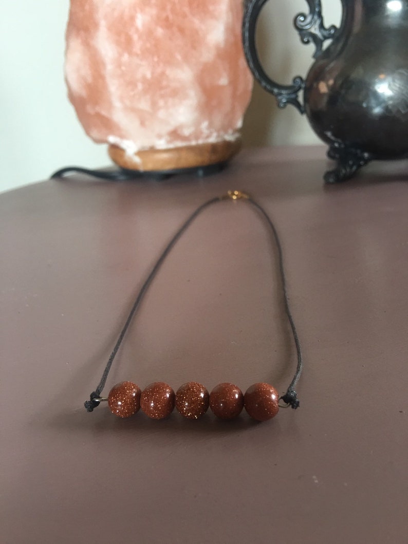 Goldstone choker