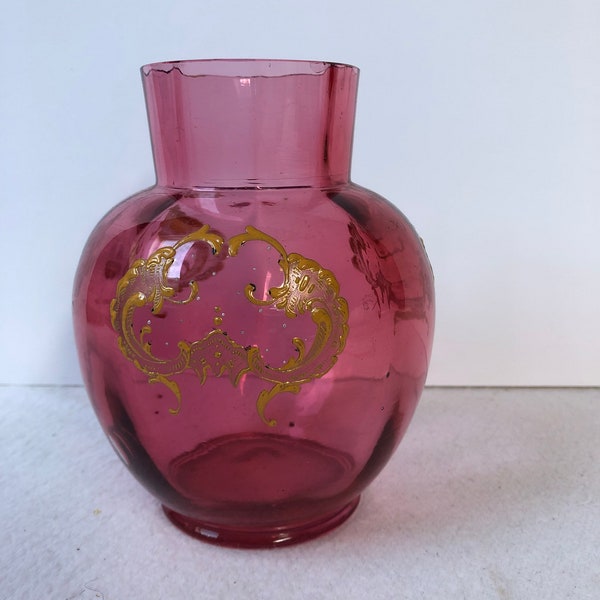 Pretty cranberry glass vase.